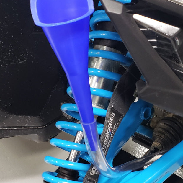 Can-Am X3 Differential Fill Adapter Tool Use the aluminum adapter, thread it into the fluid fill plug where the stock X3 plug is, attach the supplied hose, run to an easy to accessible location and use your favorite funnel in the hose to fill your X3 with fluid. When your done just detach the hose from the adapter, unthread it, and reinstall the plug. It's really that easy.