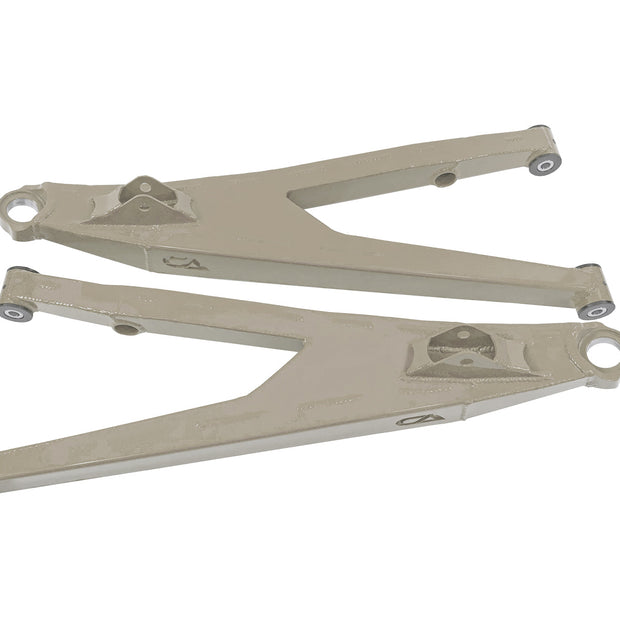 Can-Am Maverick X3 Upper Boxed Control Arms are laser cut from 4130 chromoly then CNC broke for quality and accuracy. Comes complete with 25% larger bushings installed to decrease wear and increase bushing life. Made with TIVAR® a high quality UHMW-PE material and is resistant to most all chemicals and conditions.