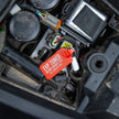 ECU Warning Zip Tie attached to diagnostic port